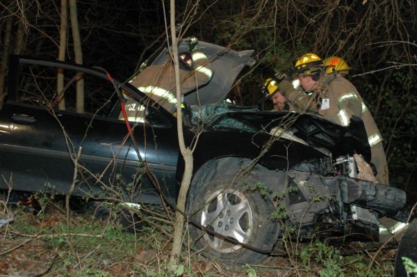 Crash Victims Rescued From Vehicle